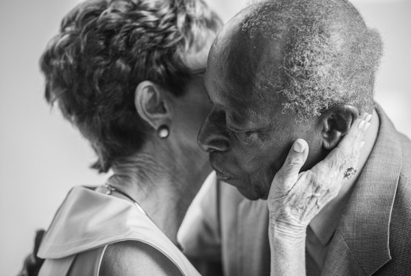 A Loving Touch - Elderly couple embraces